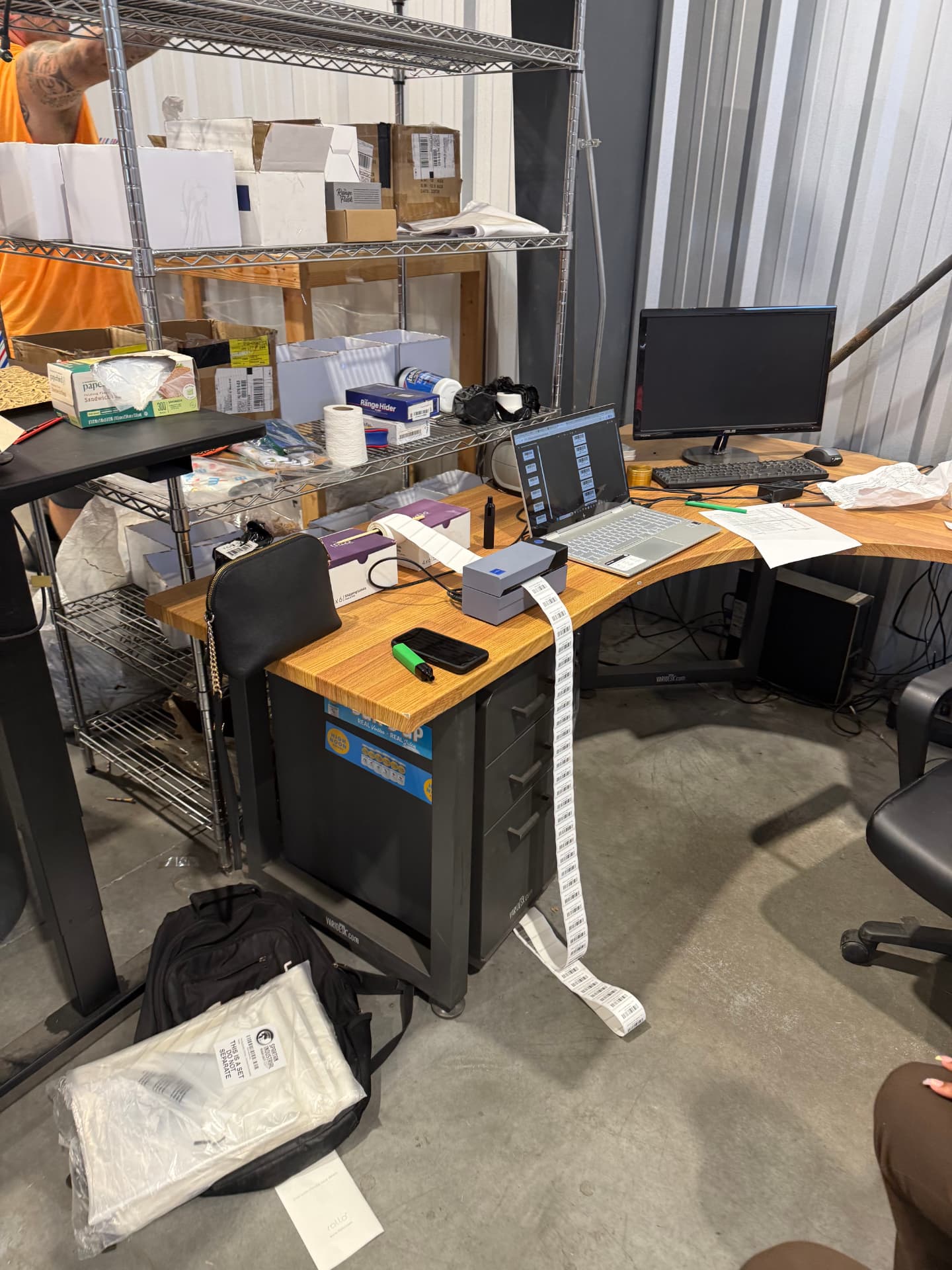 Label printers, order sheets and inventory — where every order gets checked.